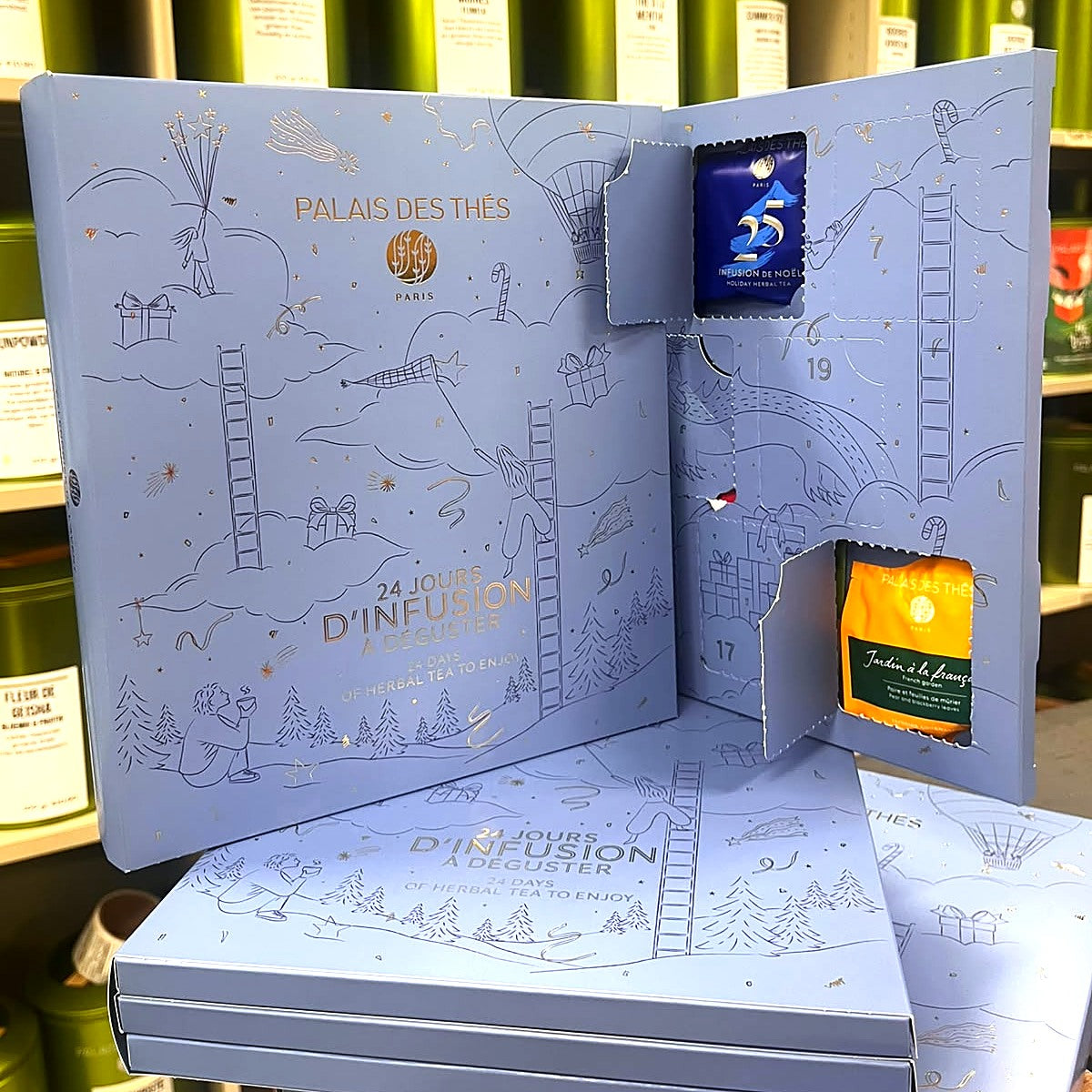 Geopende kruidentheekalender met Infusion de Noël en Jardin à la Française achter de deurtjes